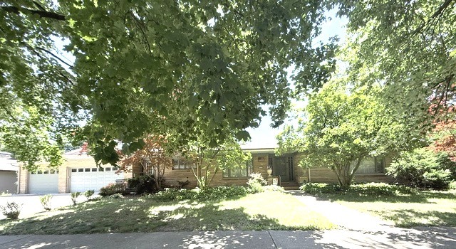 809 West Delaware Avenue Urbana, IL 61801 - Photo 2 of 10 a view of backyard of house