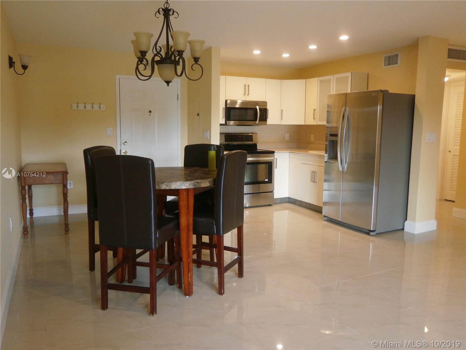 9459 Southwest 76th Street, Unit R4 Miami, FL 33173 - Photo 2 of 19