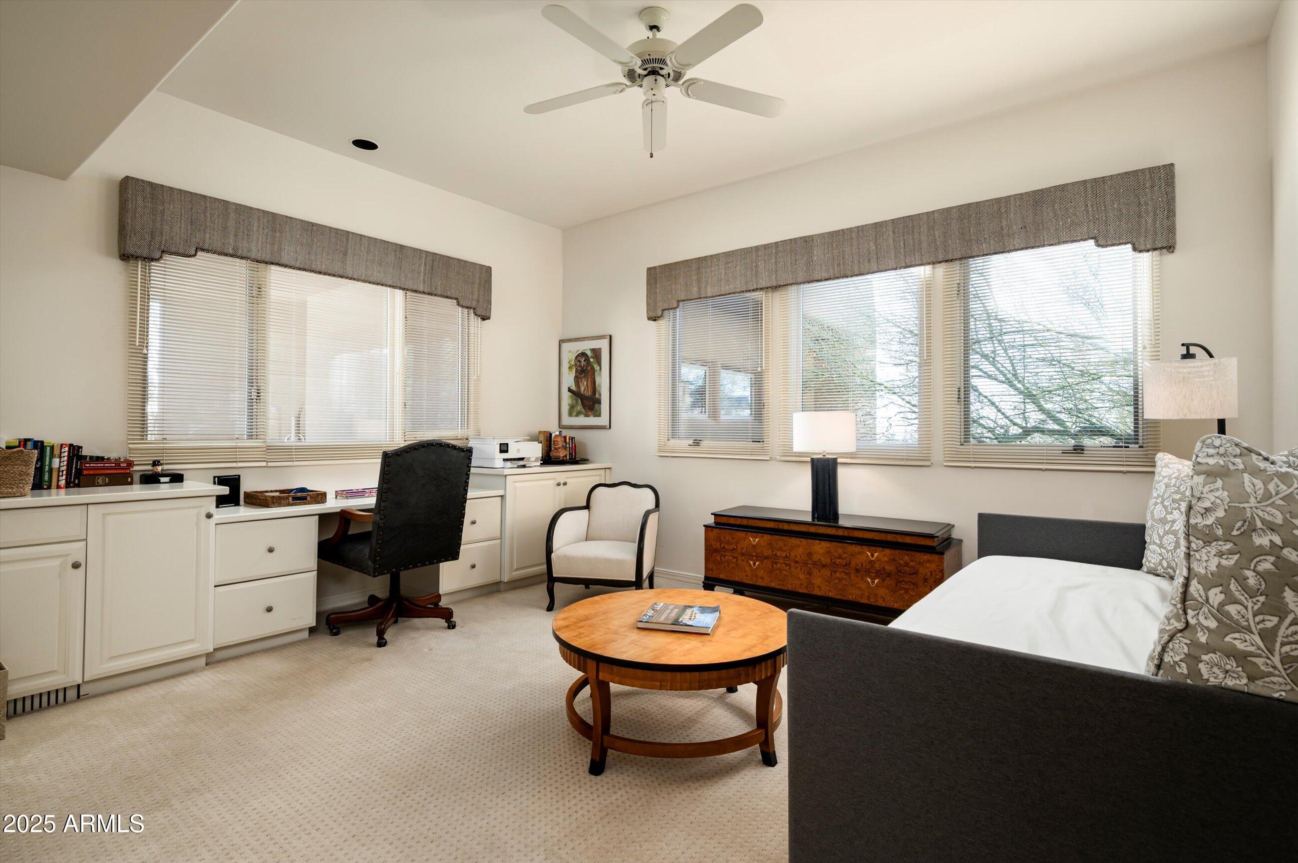 10040 East Happy Valley Road, Unit 274 Scottsdale, AZ 85255 - Photo 33 of 73 a living room with furniture and windows