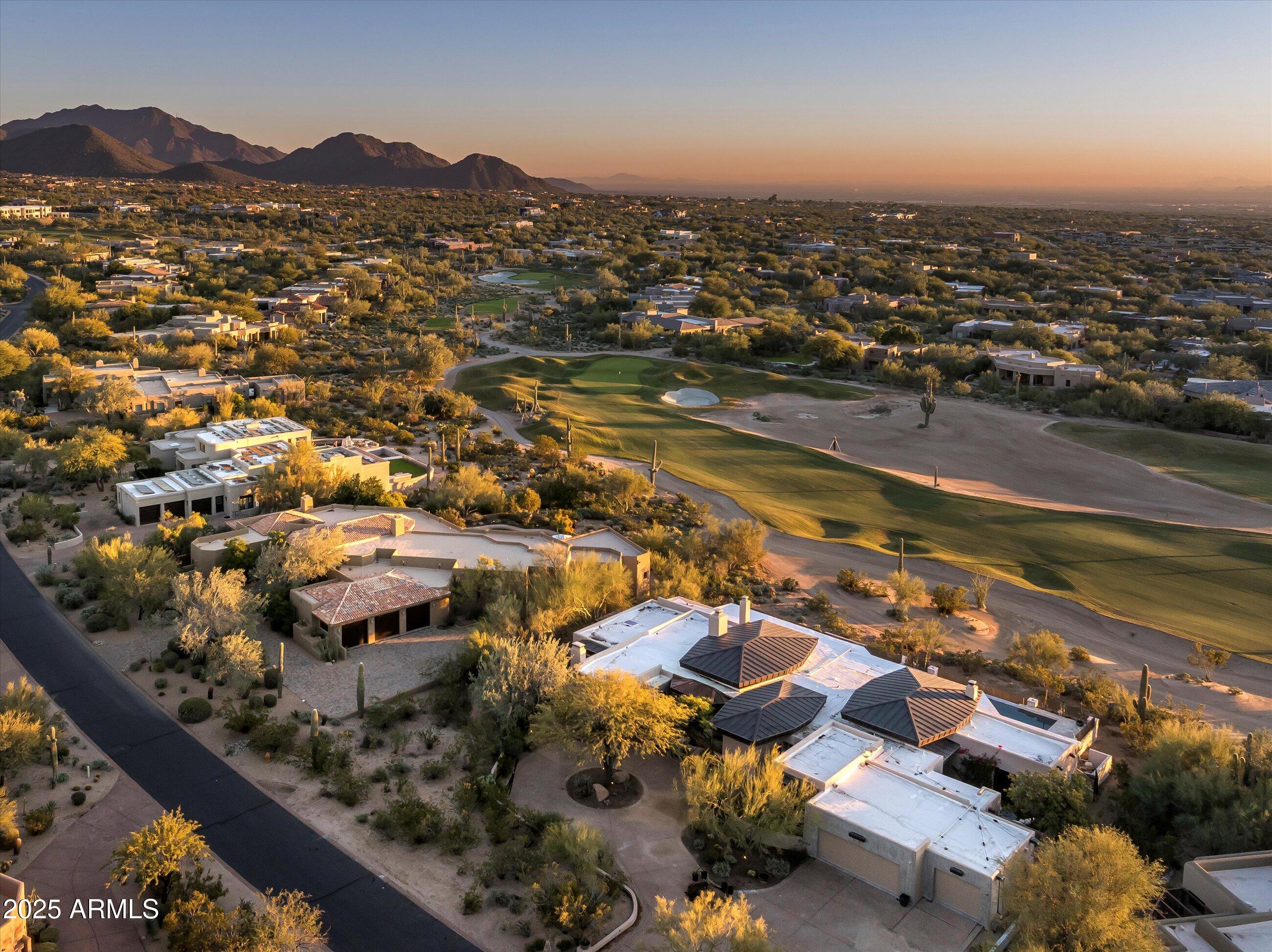 10040 East Happy Valley Road, Unit 274 Scottsdale, AZ 85255 - Photo 4 of 73 an aerial view of residential houses with outdoor space