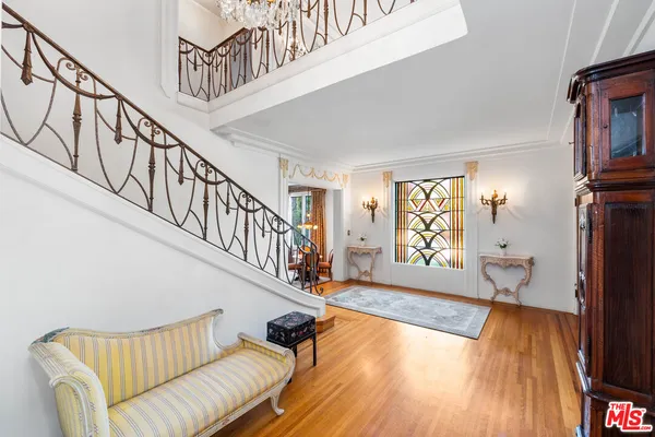 a livingroom with furniture staircase and a living room
