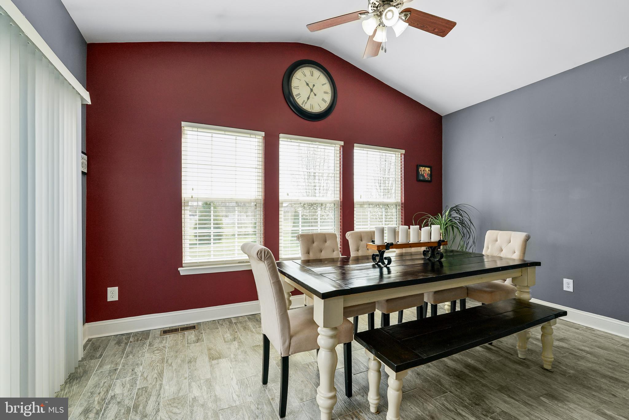 144 Abbigail Crossing Townsend, DE 19734 - Photo 15 of 33 a view of a dining room with furniture window and wooden floor