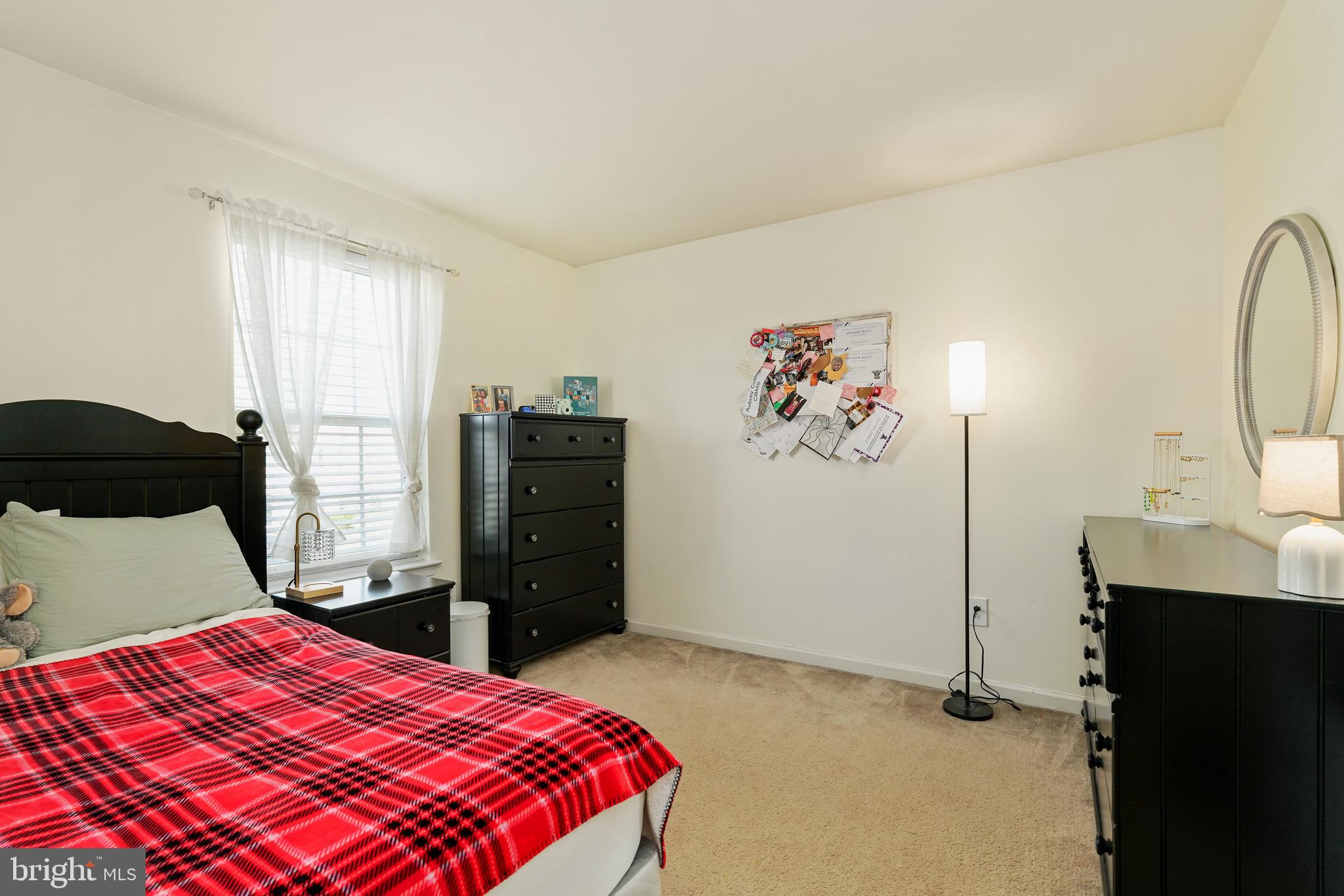 144 Abbigail Crossing Townsend, DE 19734 - Photo 19 of 33 a bedroom with a bed and a dresser