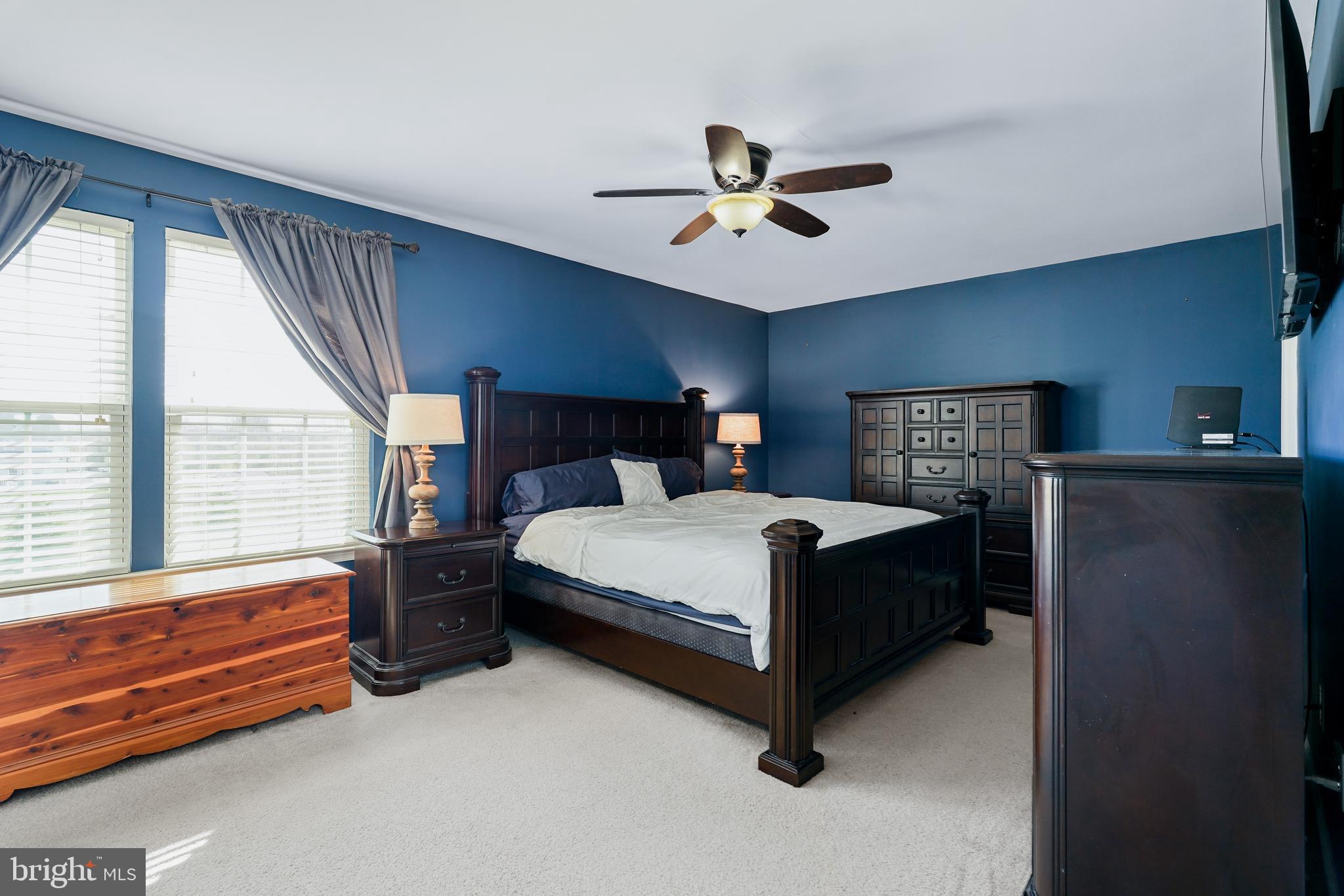 144 Abbigail Crossing Townsend, DE 19734 - Photo 21 of 33 a bedroom with a bed and window