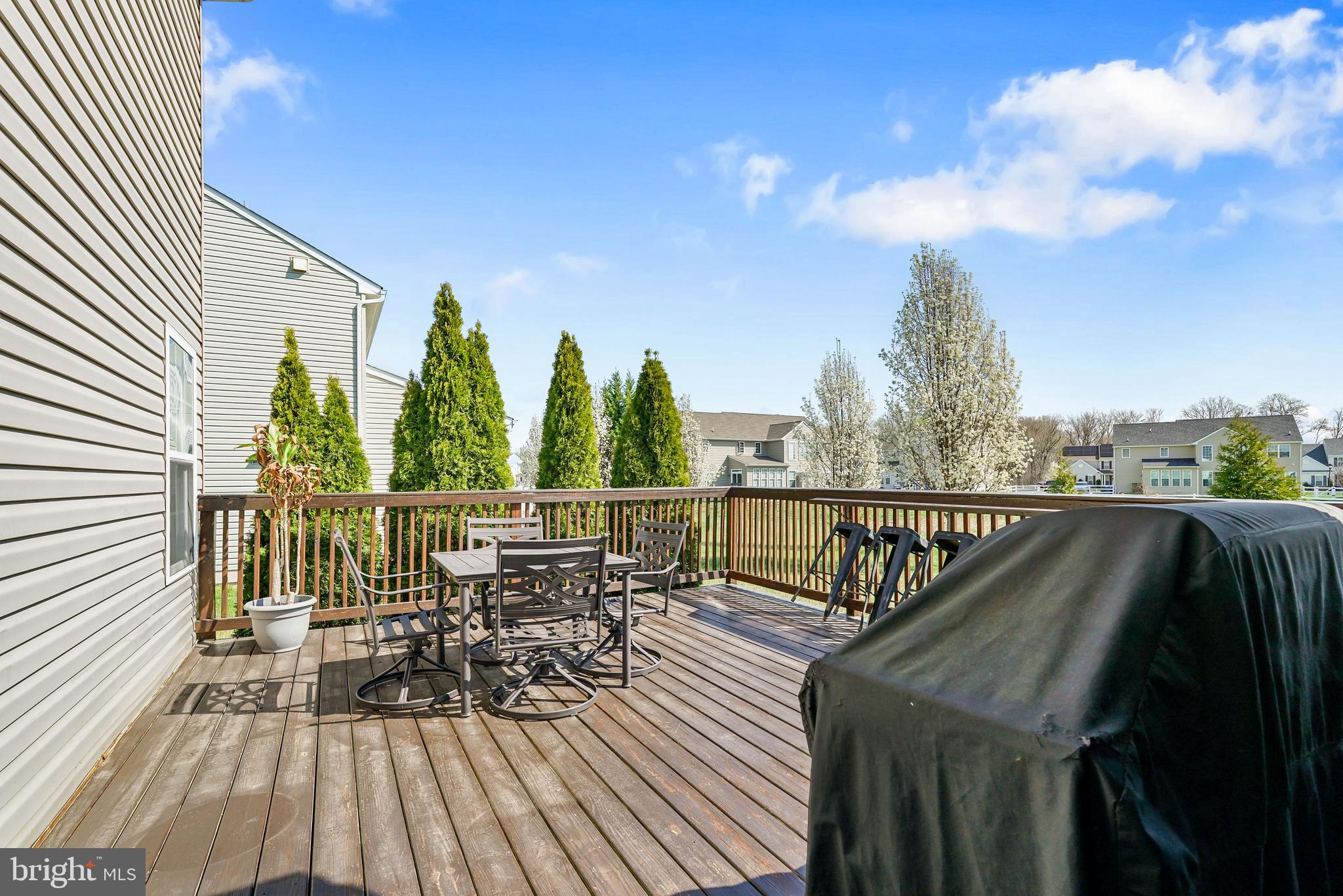144 Abbigail Crossing Townsend, DE 19734 - Photo 28 of 33 a view of balcony with furniture and wooden floor