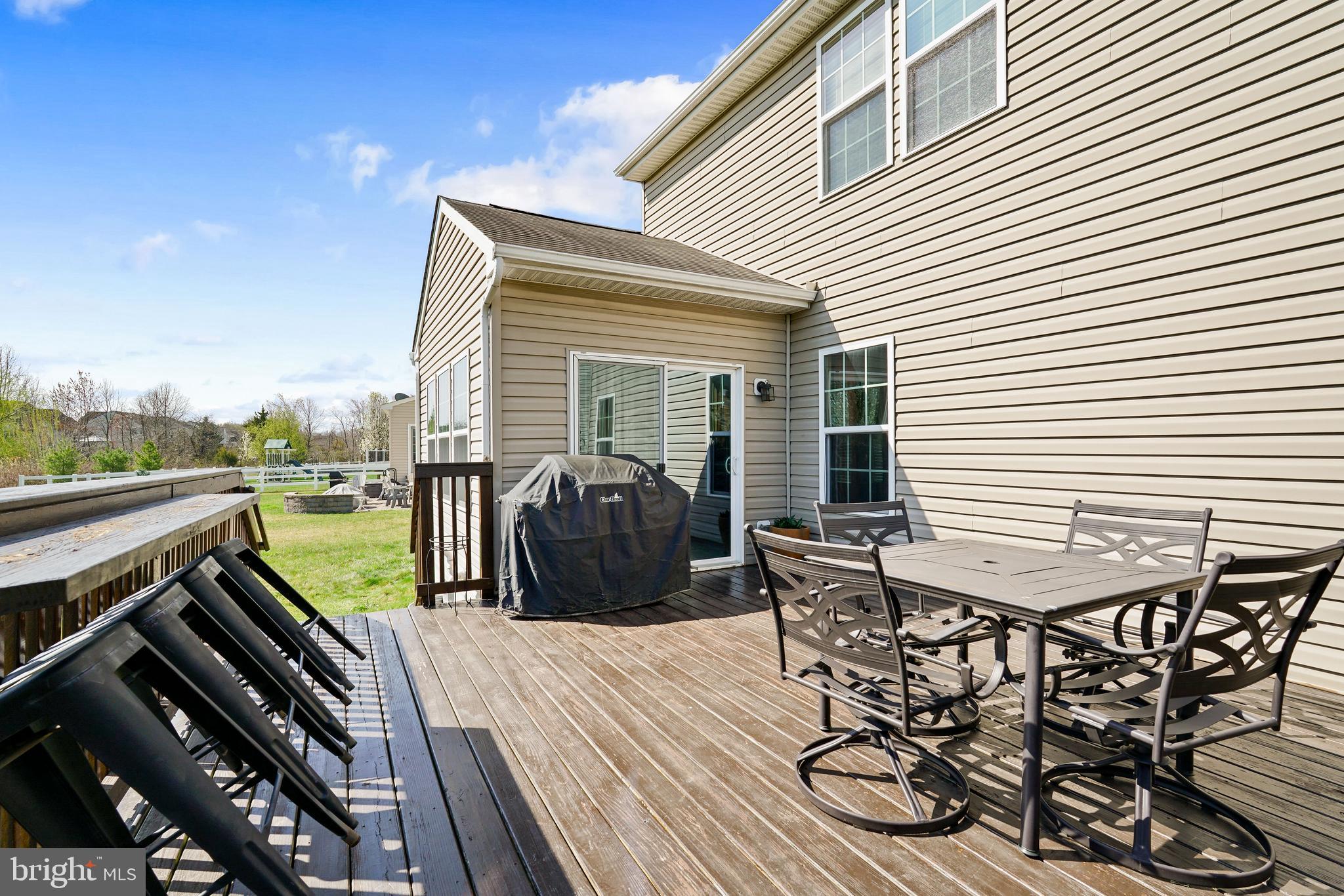 144 Abbigail Crossing Townsend, DE 19734 - Photo 30 of 33 a view of a chairs and table on the terrace