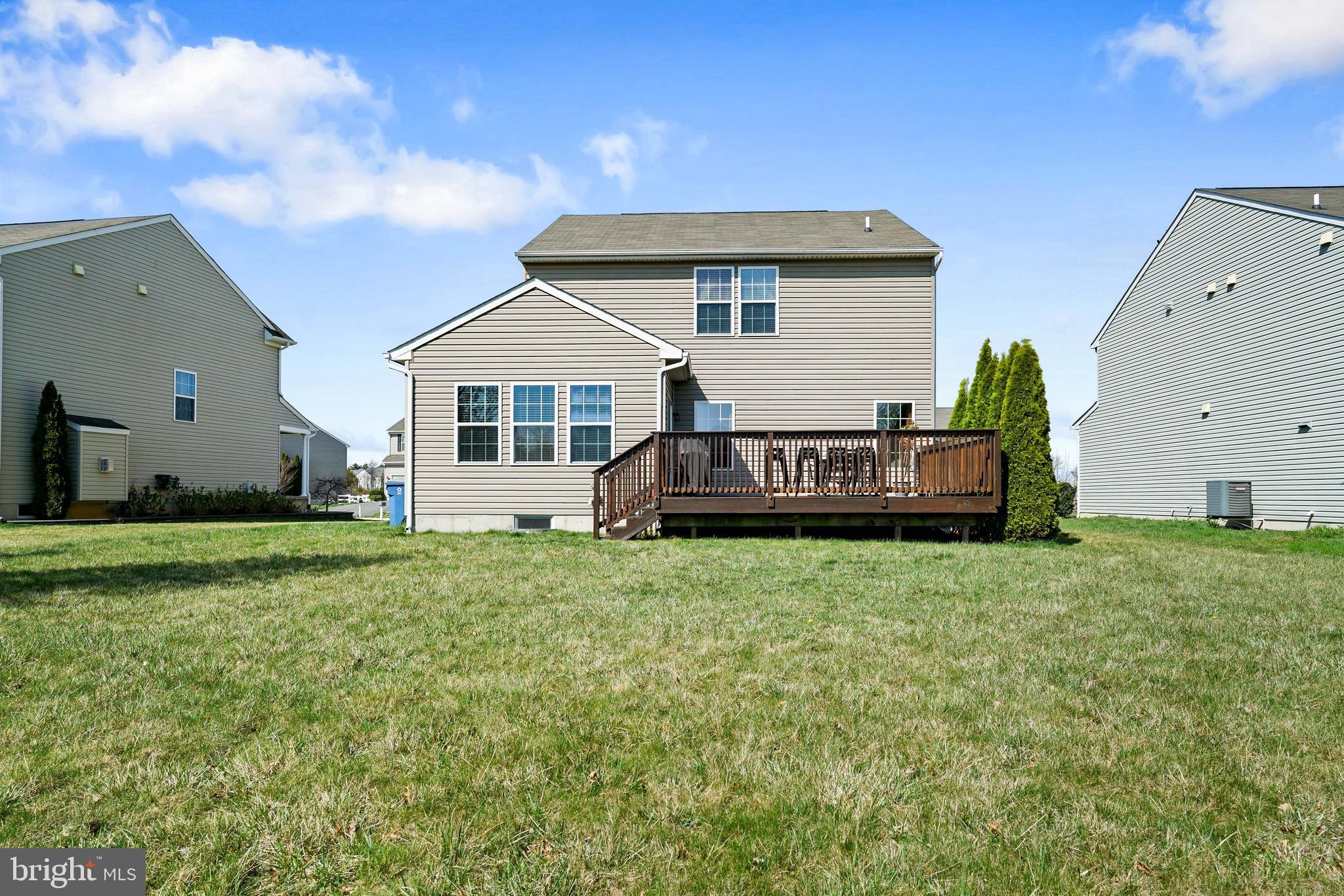 144 Abbigail Crossing Townsend, DE 19734 - Photo 32 of 33 a view of a house with backyard and garden