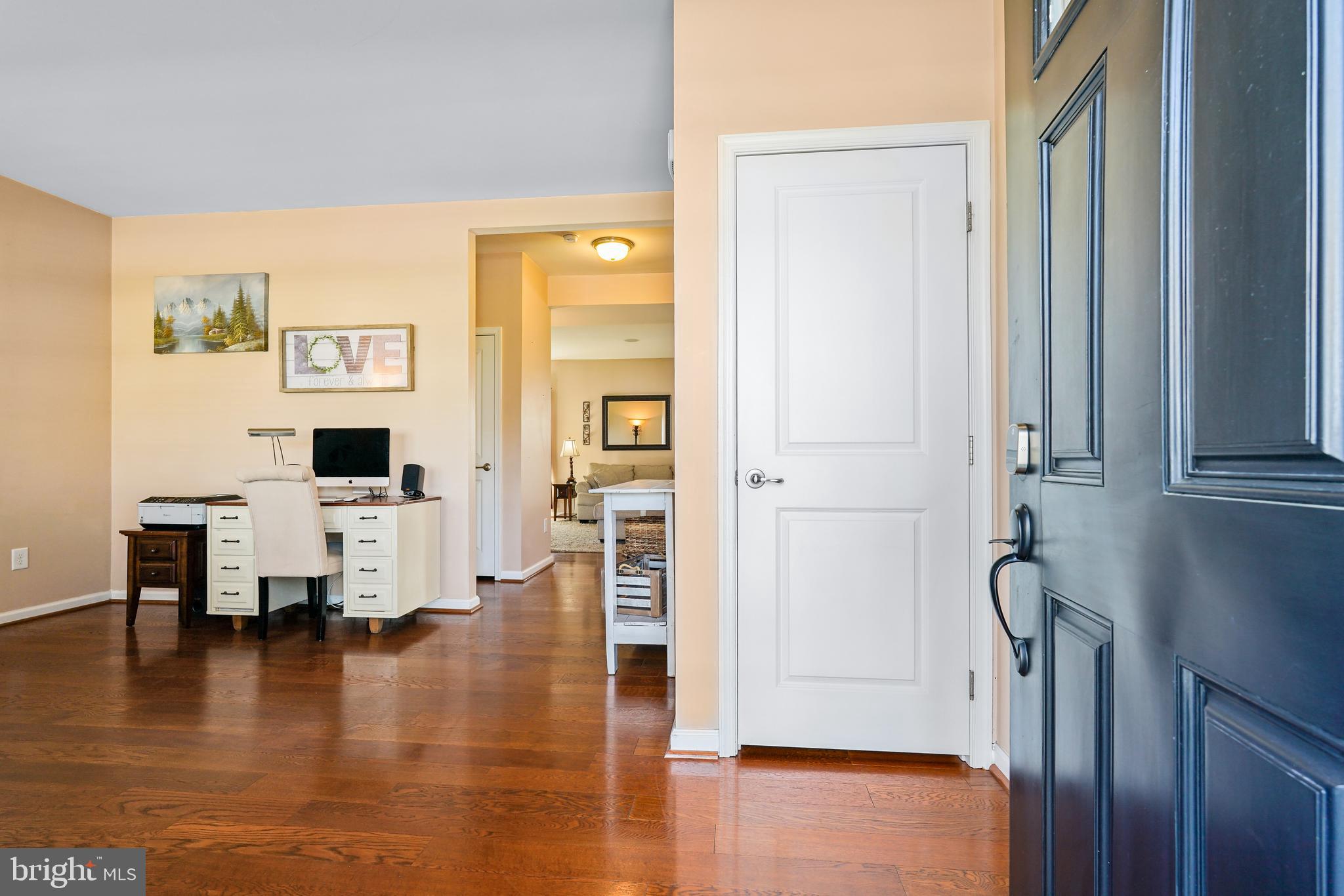 144 Abbigail Crossing Townsend, DE 19734 - Photo 4 of 33 a view of living room with furniture and wooden floor