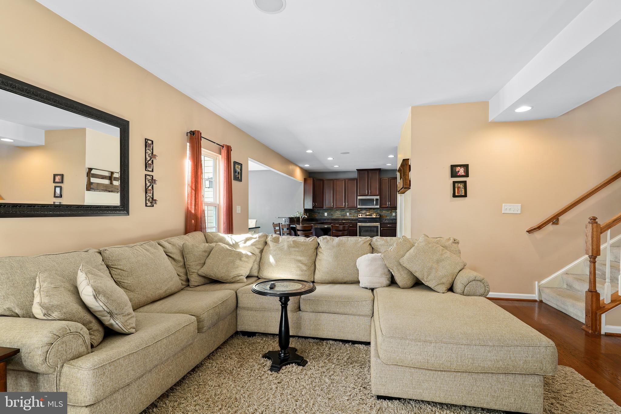 144 Abbigail Crossing Townsend, DE 19734 - Photo 9 of 33 a living room with furniture and a couch