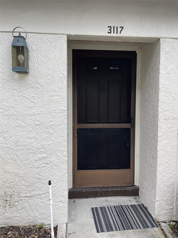 3117 Mission Grove Drive Palm Harbor, FL 34684 - Photo 3 of 25 a view of a door of the house