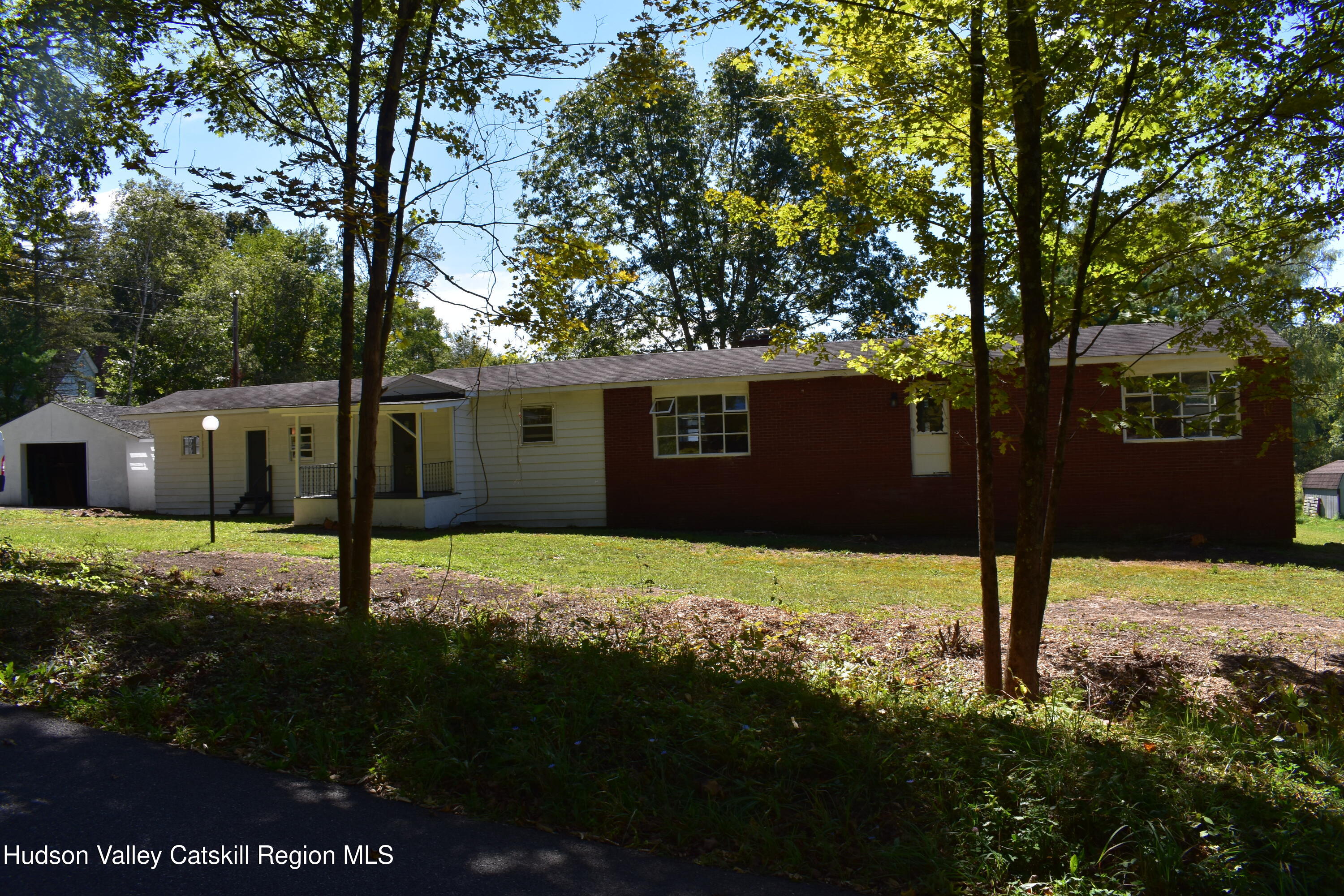 64 Dashville Road New Paltz, NY 12561 - Photo 1 of 45 a house view with a backyard space