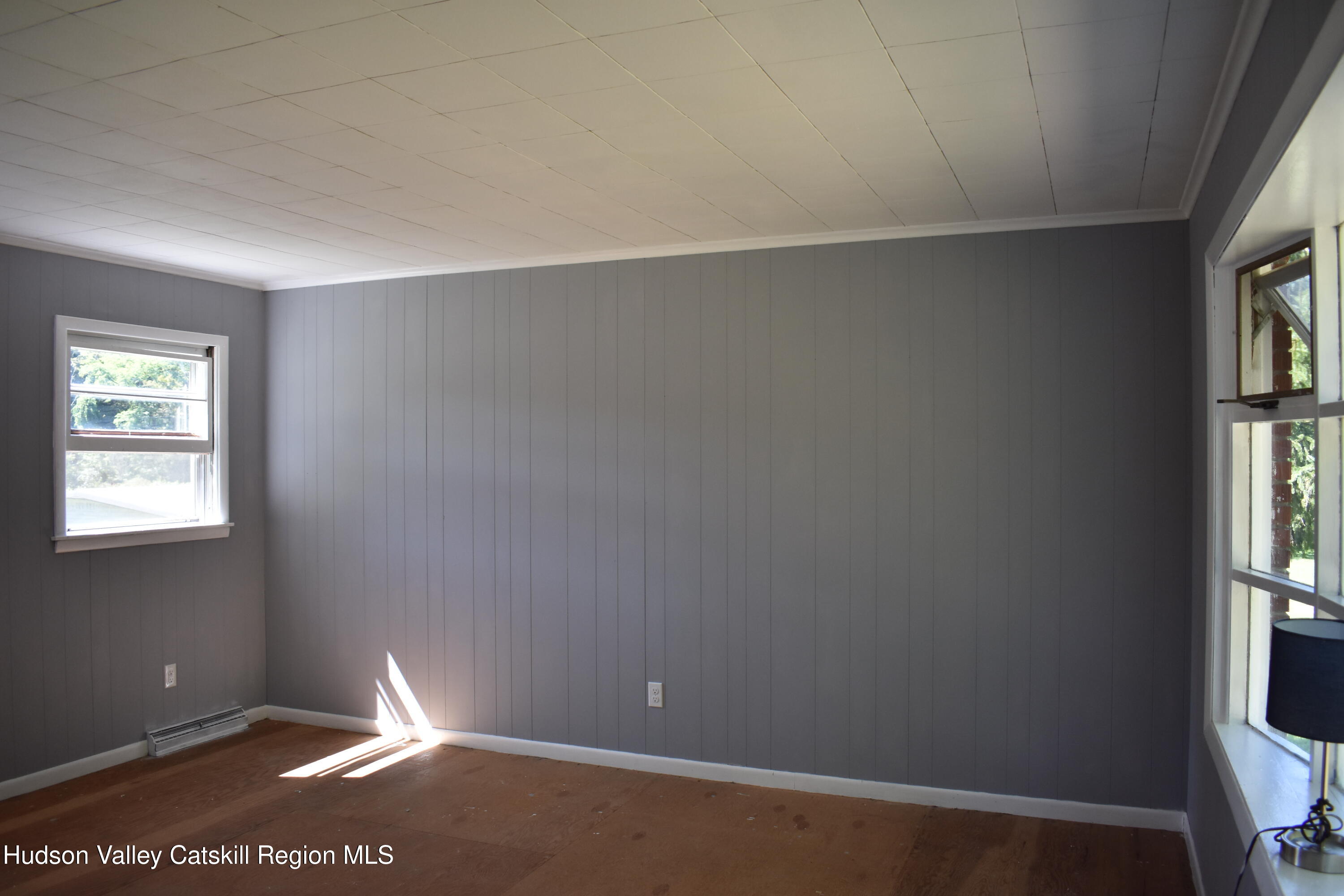 64 Dashville Road New Paltz, NY 12561 - Photo 12 of 45 an empty room with windows