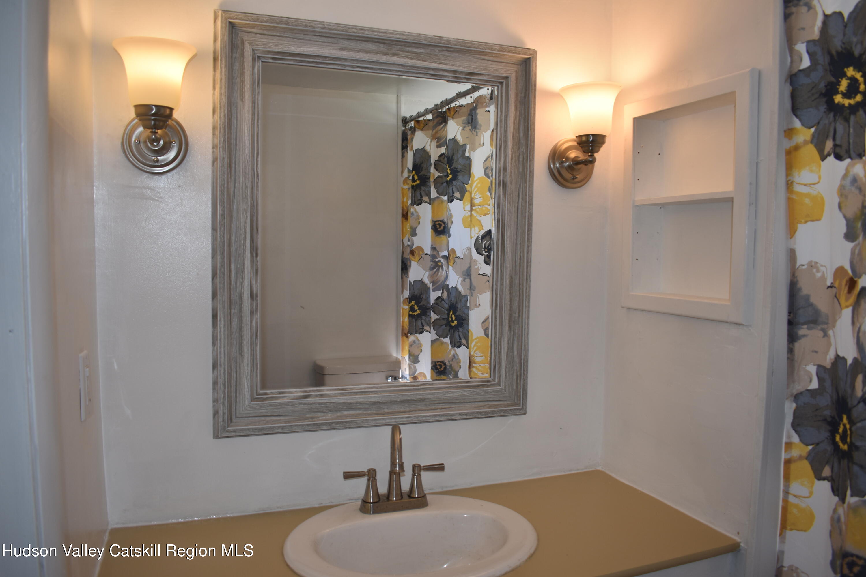 64 Dashville Road New Paltz, NY 12561 - Photo 14 of 45 a bathroom with a sink and a mirror