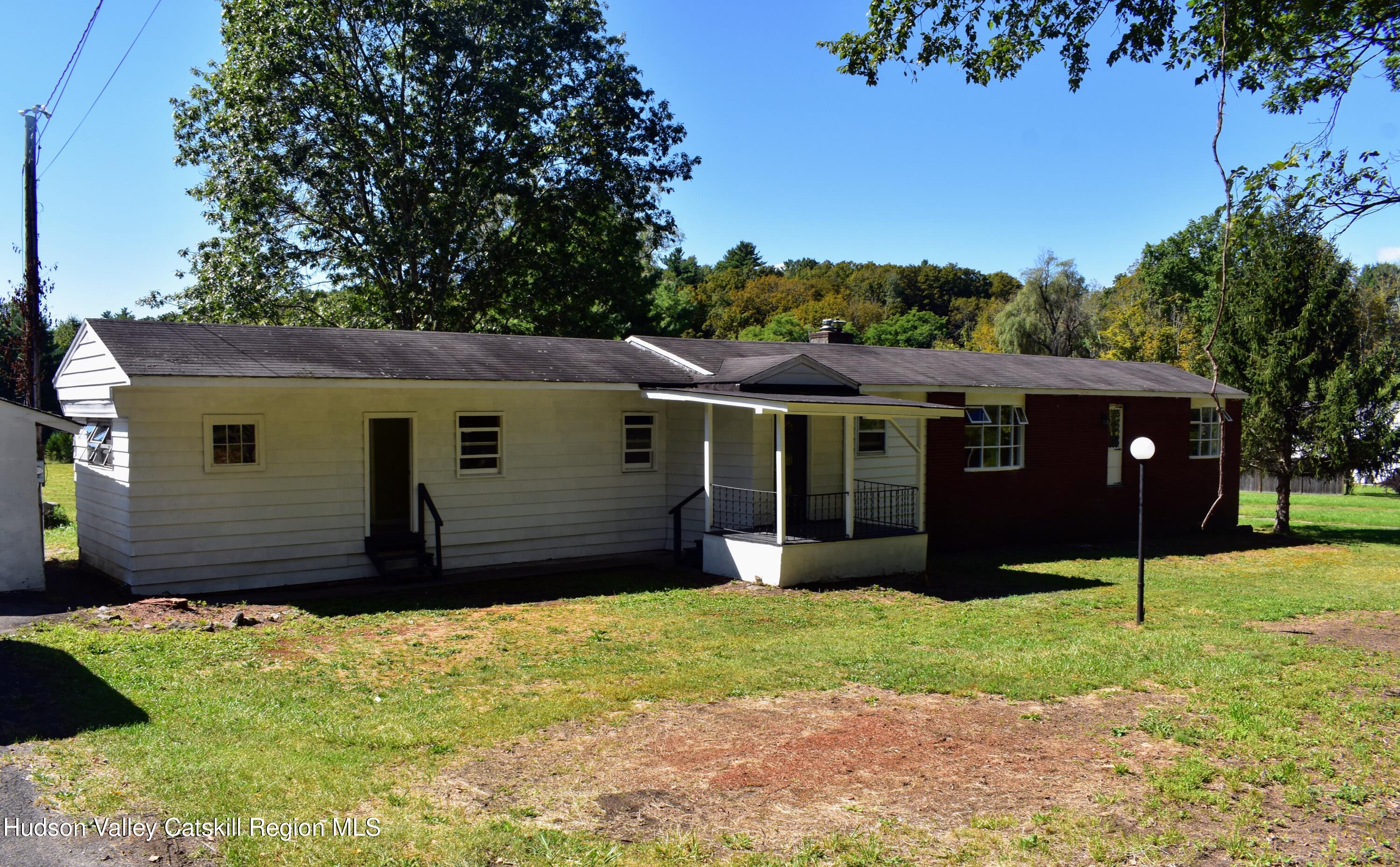 64 Dashville Road New Paltz, NY 12561 - Photo 2 of 45 front view of a house with a yard