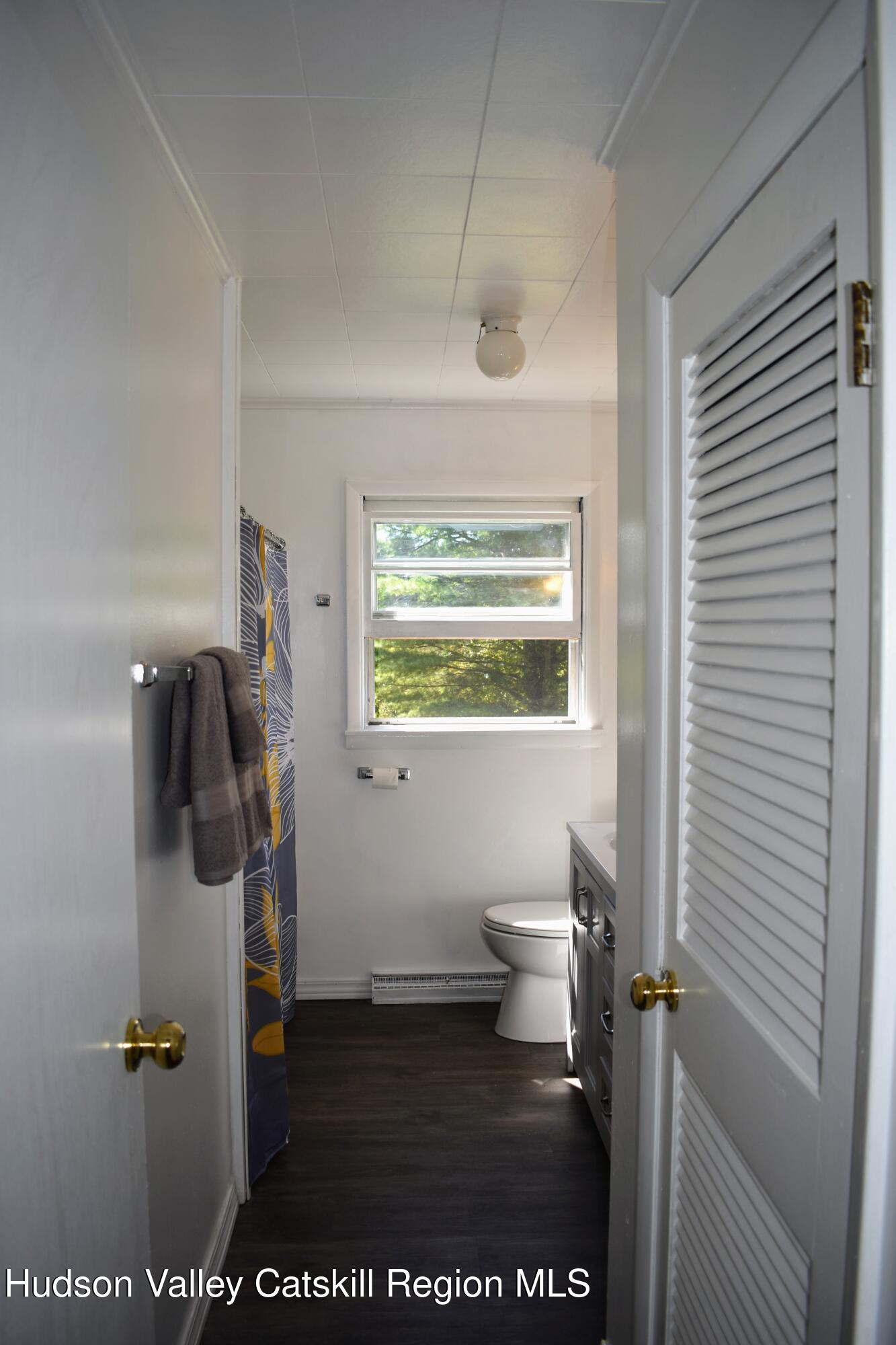 64 Dashville Road New Paltz, NY 12561 - Photo 24 of 45 a bathroom with a toilet and a shower