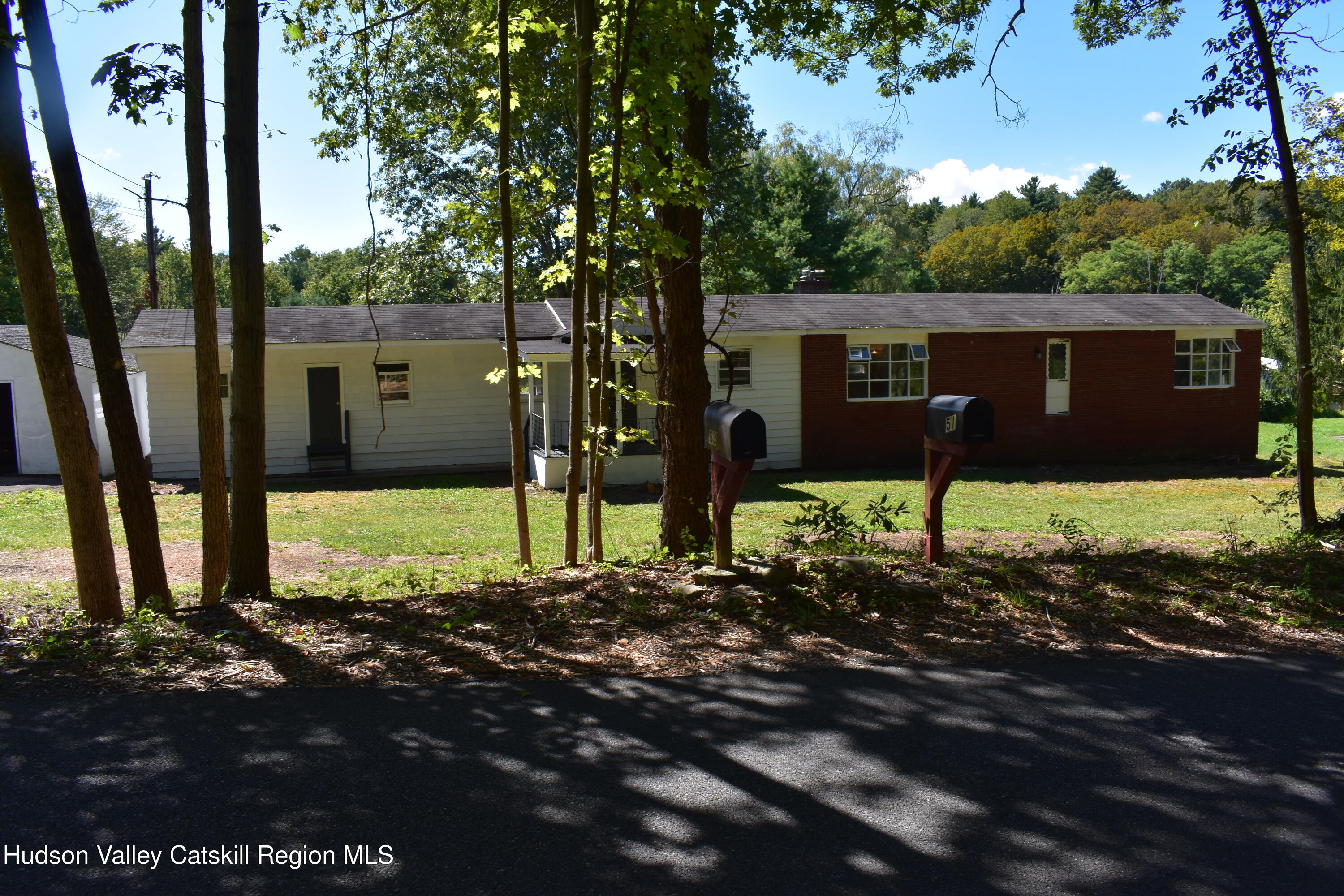 64 Dashville Road New Paltz, NY 12561 - Photo 3 of 45 a view of a house with a backyard