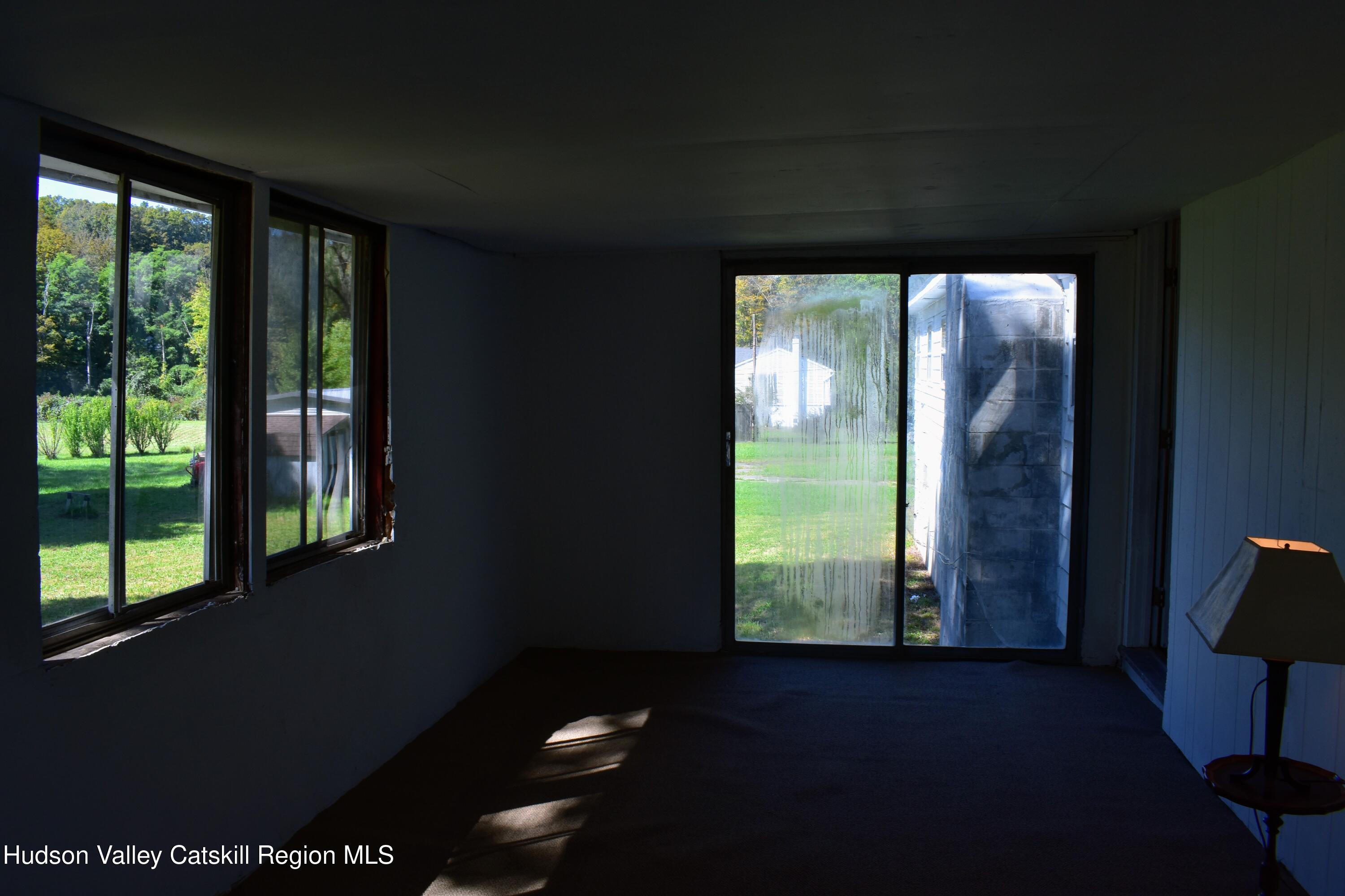 64 Dashville Road New Paltz, NY 12561 - Photo 38 of 45 a view of an empty room with a window