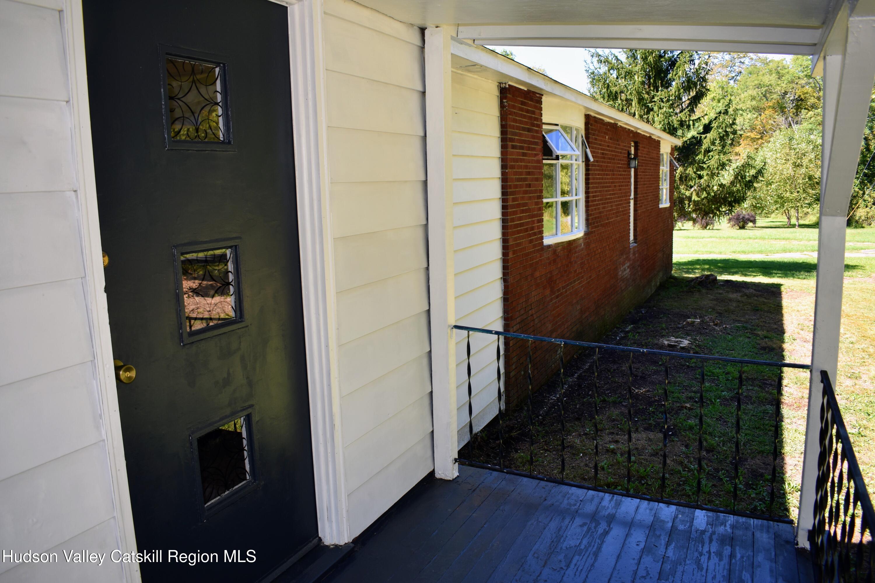 64 Dashville Road New Paltz, NY 12561 - Photo 6 of 45 a view of balcony and wooden floor