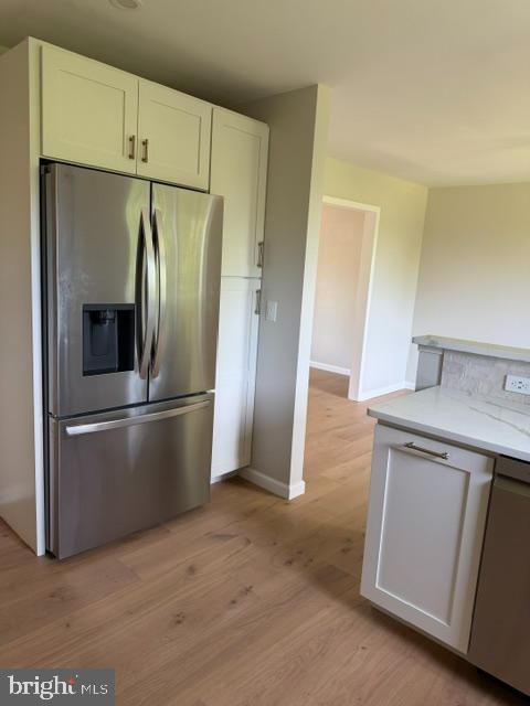 12 Wren Road Gilbertsville, PA 19525 - Photo 9 of 17 a kitchen with stainless steel appliances granite countertop a refrigerator and a sink