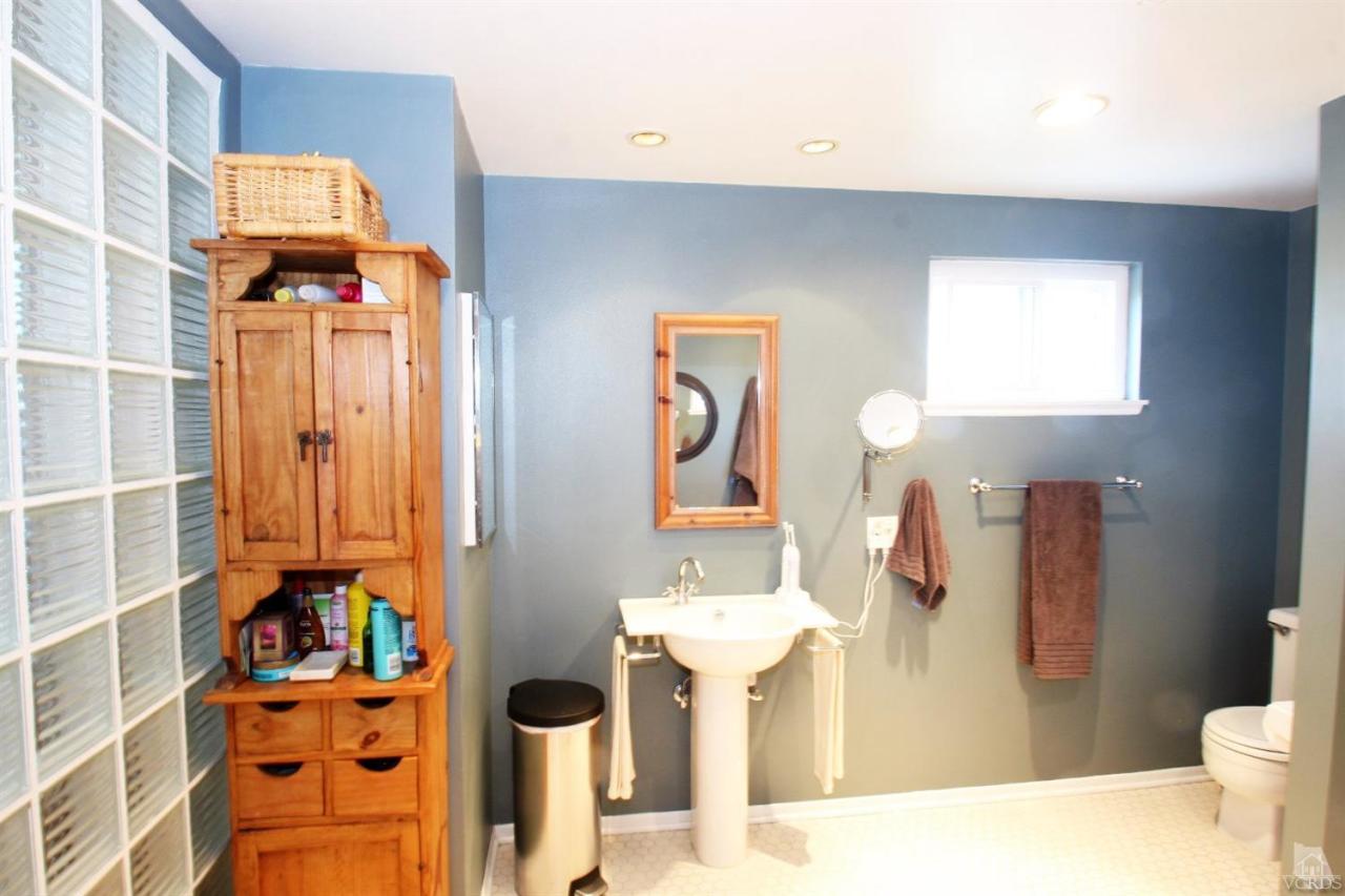 1800 Capstan Drive Oxnard, CA 93035 - Photo 11 of 15 a bathroom with a sink toilet and shower