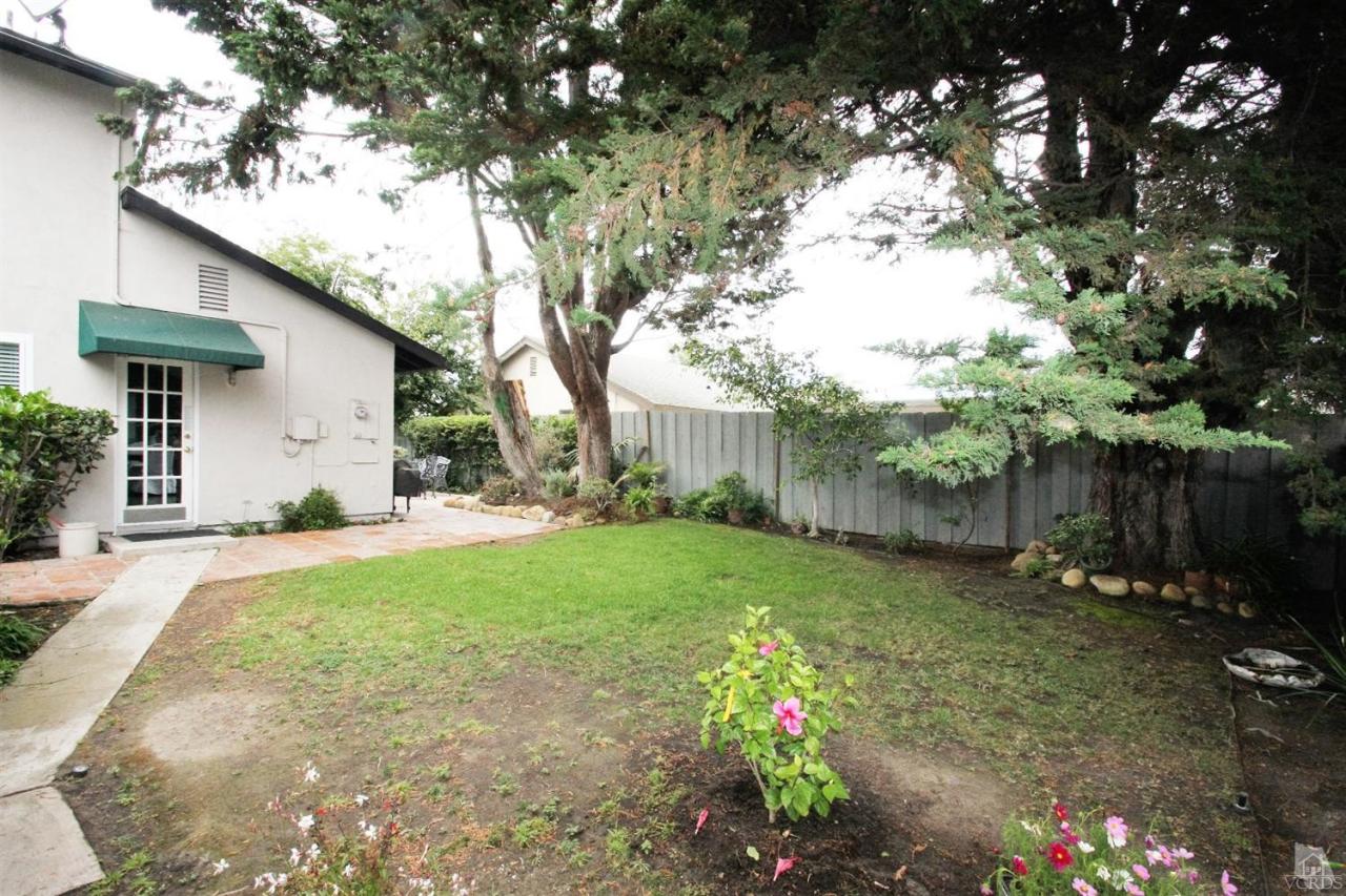 1800 Capstan Drive Oxnard, CA 93035 - Photo 14 of 15 a backyard of a house with lots of green space