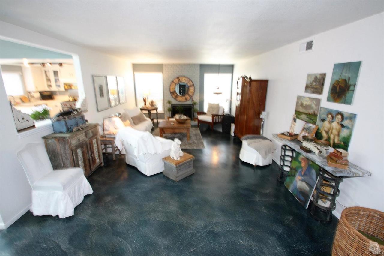 1800 Capstan Drive Oxnard, CA 93035 - Photo 3 of 15 a living room with furniture and a window