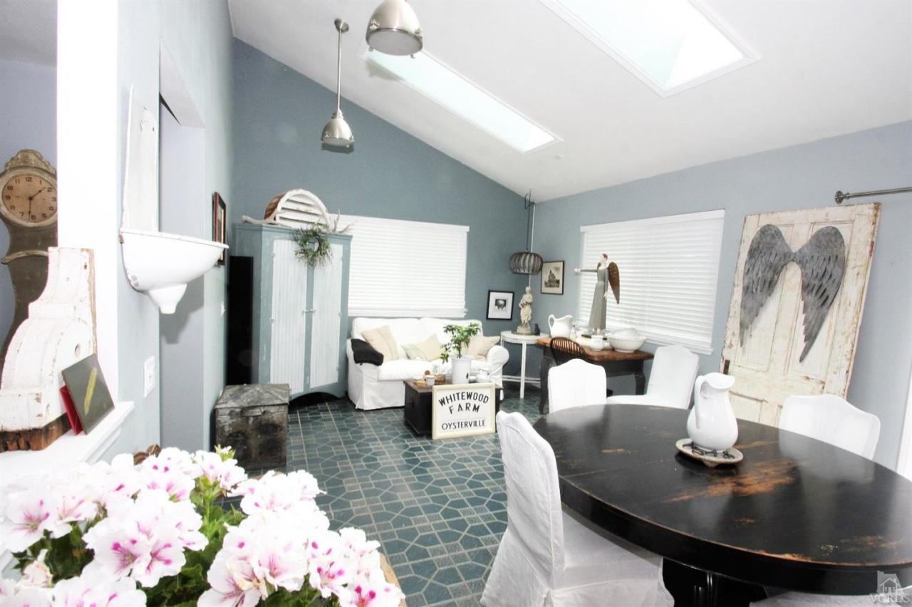 1800 Capstan Drive Oxnard, CA 93035 - Photo 8 of 15 a living room with furniture and flowers