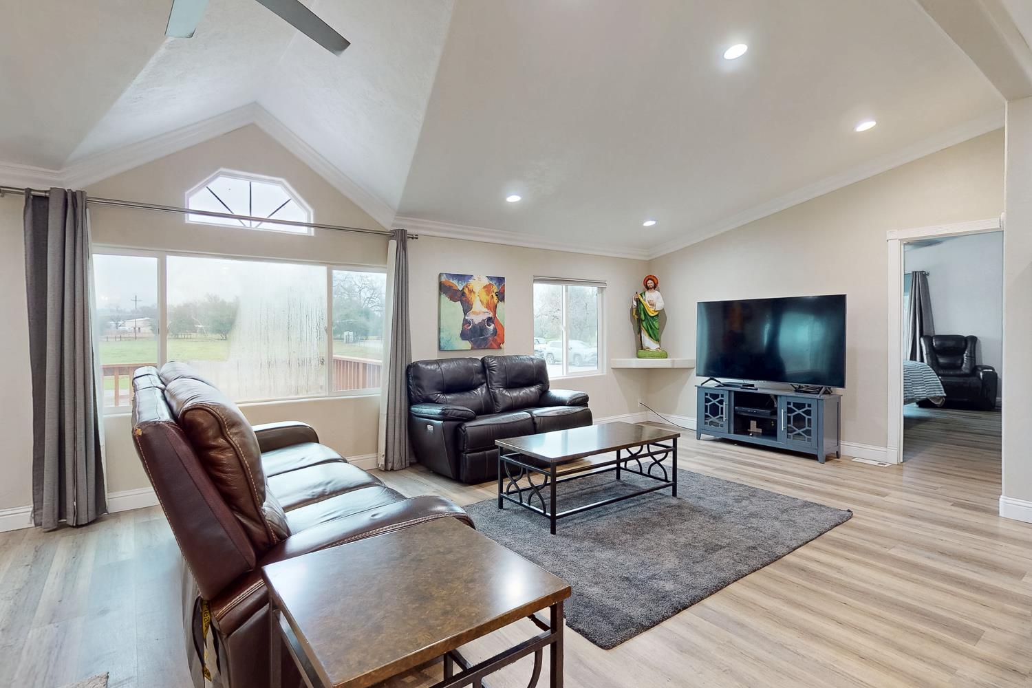 3453 La Porte Road Marysville, CA 95901 - Photo 15 of 81 a living room with furniture and a flat screen tv