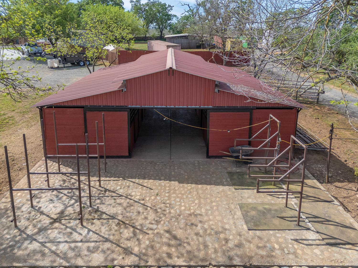 3453 La Porte Road Marysville, CA 95901 - Photo 3 of 95 Castlebrook barn with 6 horse stalls, wash racks, automatic water, and rubber mats.