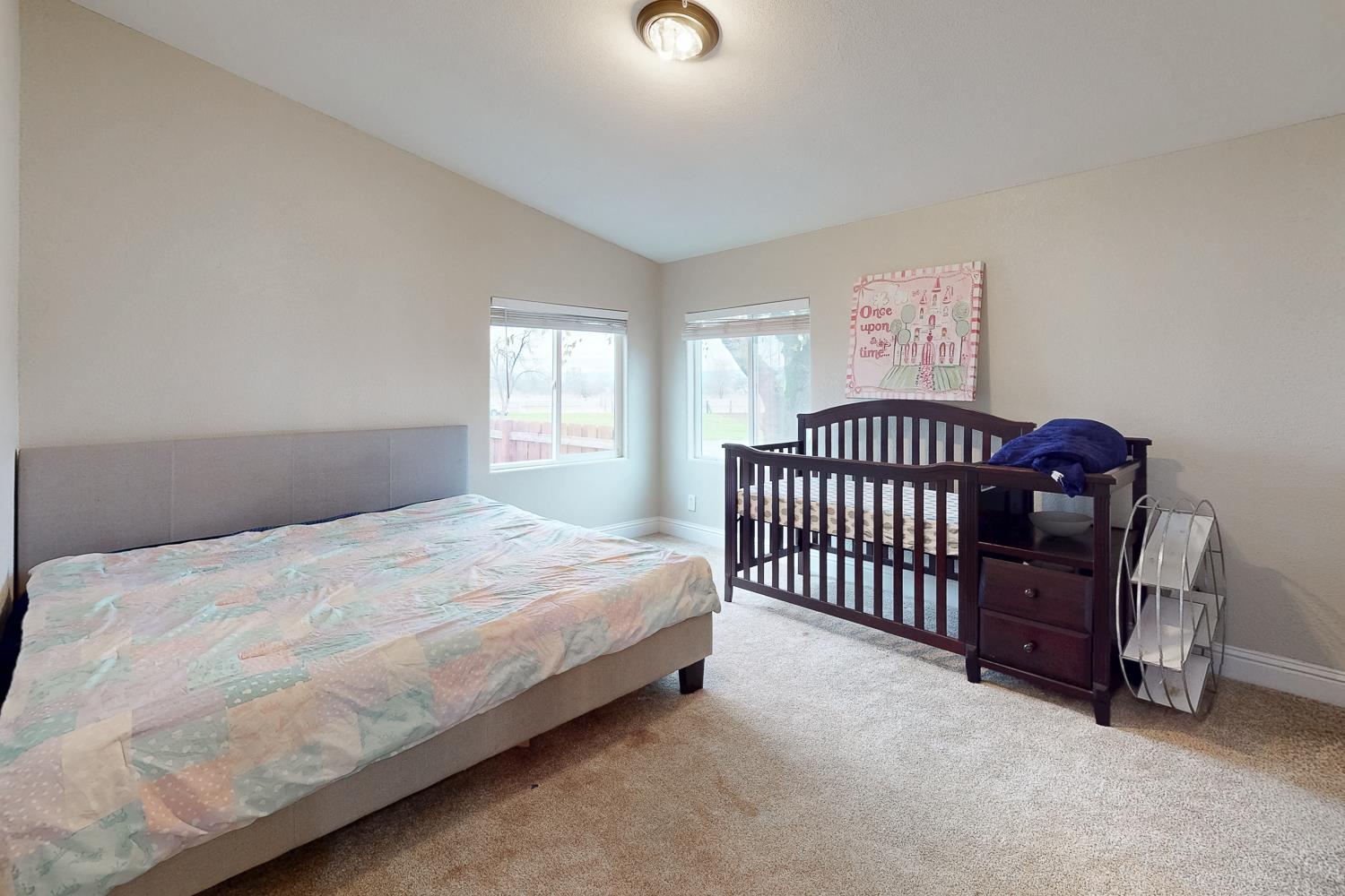 3453 La Porte Road Marysville, CA 95901 - Photo 33 of 81 a bedroom with a bed and a lamp