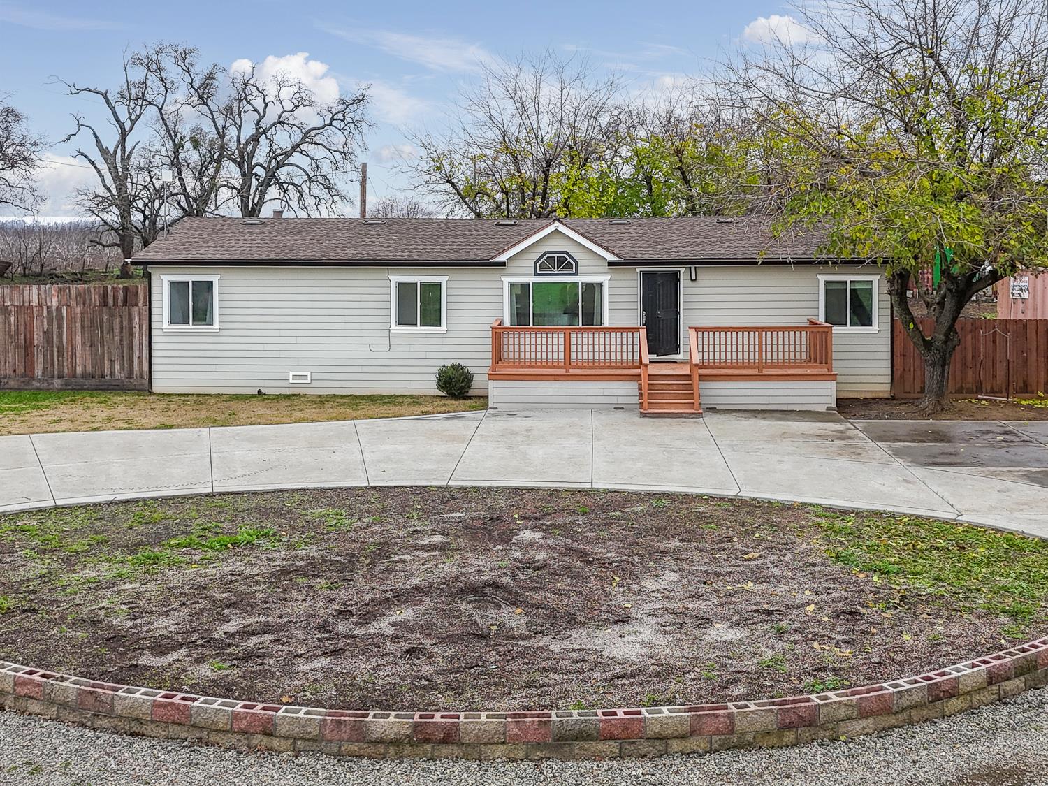 3453 La Porte Road Marysville, CA 95901 - Photo 69 of 81 a front view of a house with a yard and garage