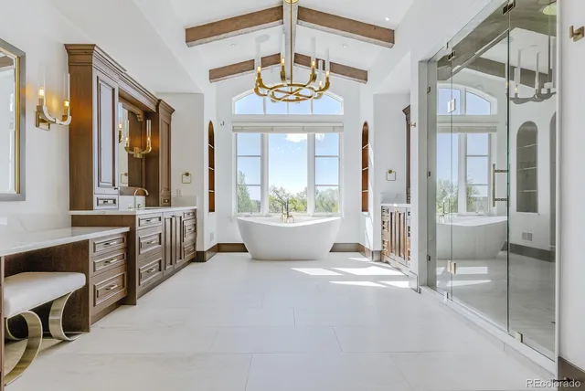 a bathroom with a bathtub and a window
