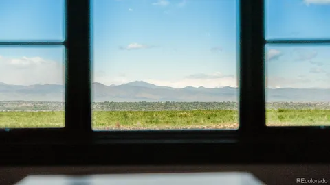 a bathroom with a sink and a window