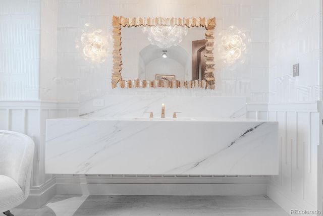 a close up of a white marble wall