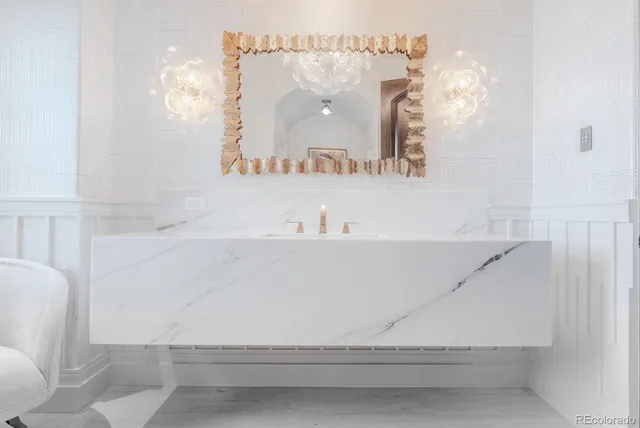 a close up of a white marble wall