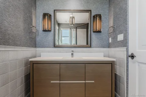 a living room with stainless steel appliances kitchen island granite countertop furniture and a kitchen view