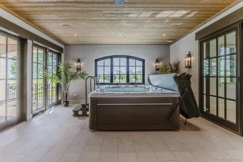 a view of a porch with a floor to ceiling window
