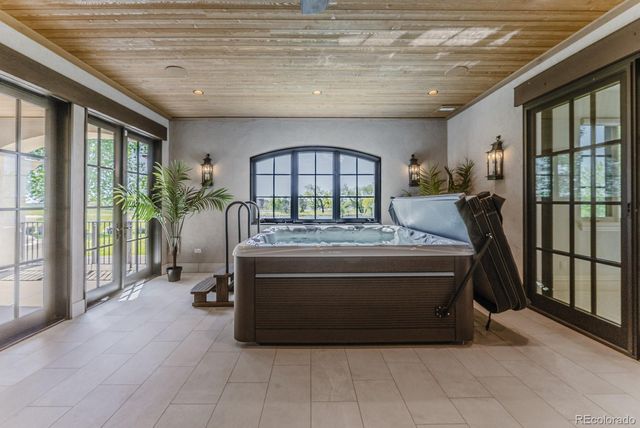 a view of a porch with a floor to ceiling window