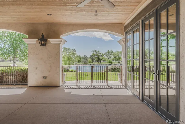 a view of a lake with a house in the background