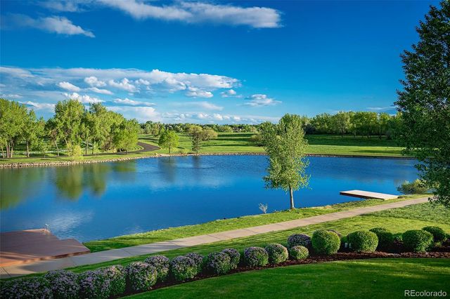 a view of a lake with a big yard