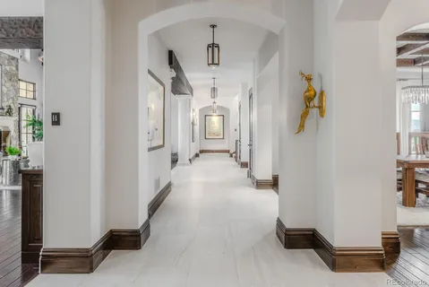 a view of a hallway with windows