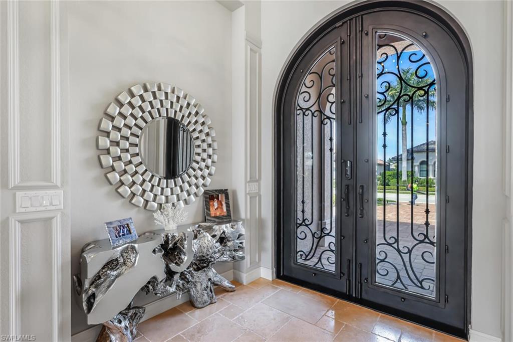 6624 Barbera Lane Naples, FL 34113 - Photo 17 of 50 a view of an entryway with a front door