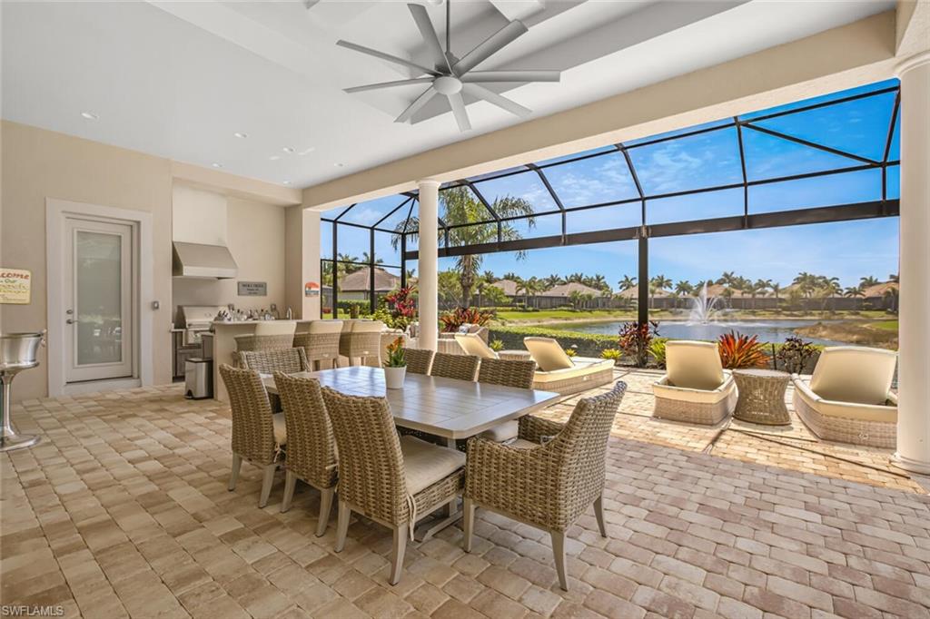 6624 Barbera Lane Naples, FL 34113 - Photo 36 of 50 a view of a dining room with furniture window and outside view