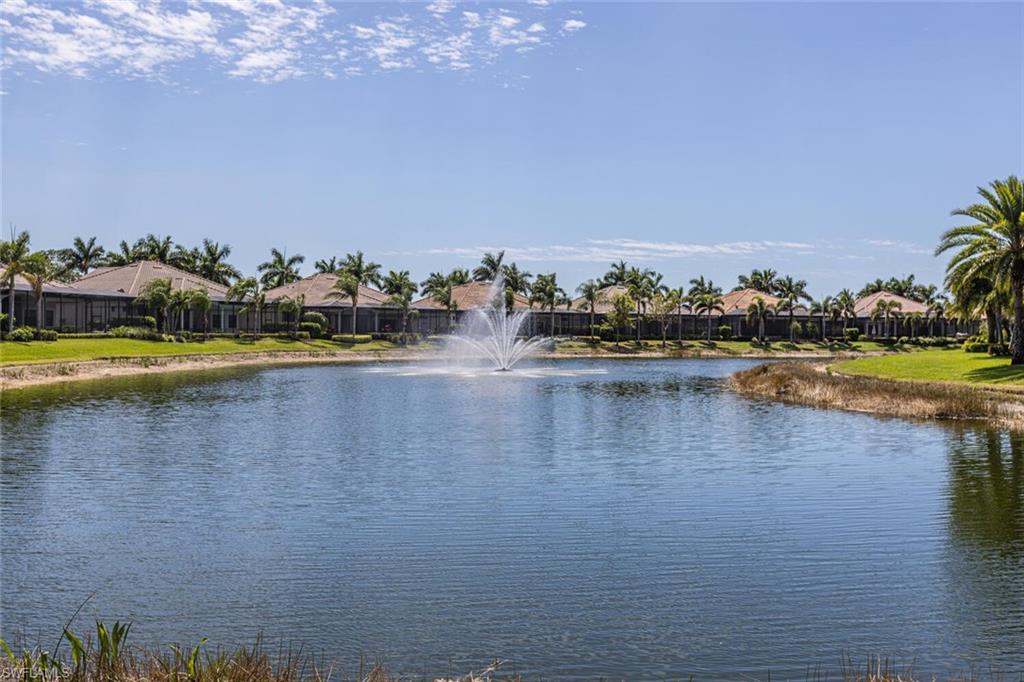 6624 Barbera Lane Naples, FL 34113 - Photo 44 of 50 a view of a lake with houses