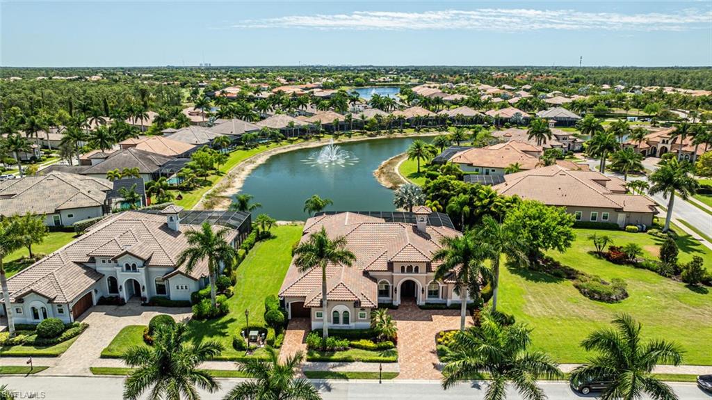 6624 Barbera Lane Naples, FL 34113 - Photo 48 of 50 an aerial view of residential houses with outdoor space