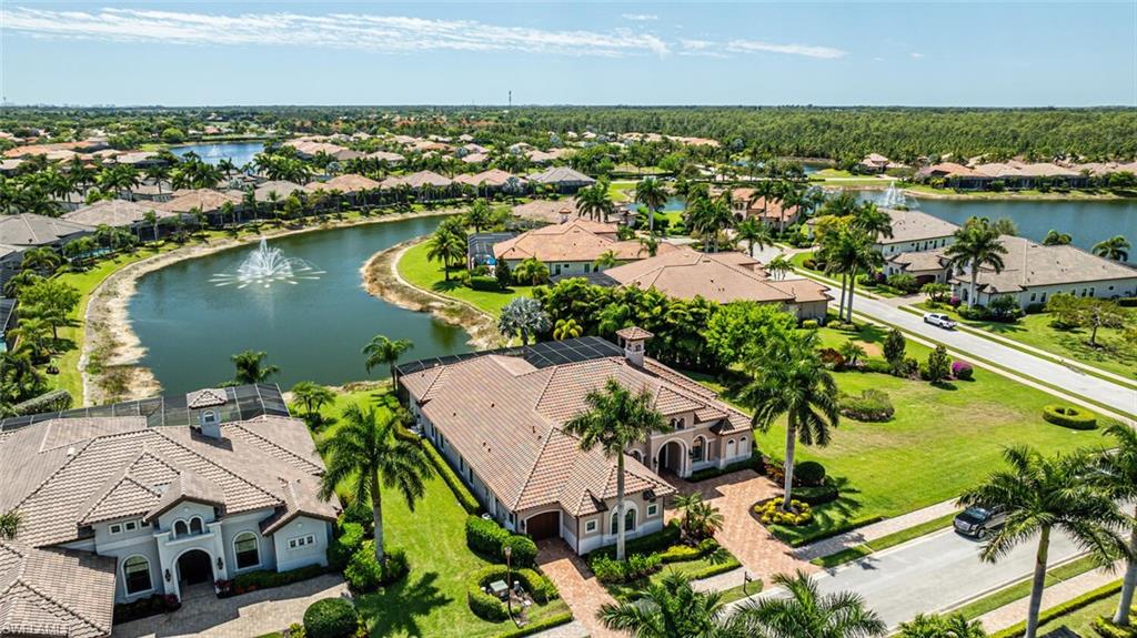 6624 Barbera Lane Naples, FL 34113 - Photo 49 of 50 an aerial view of residential houses with outdoor space