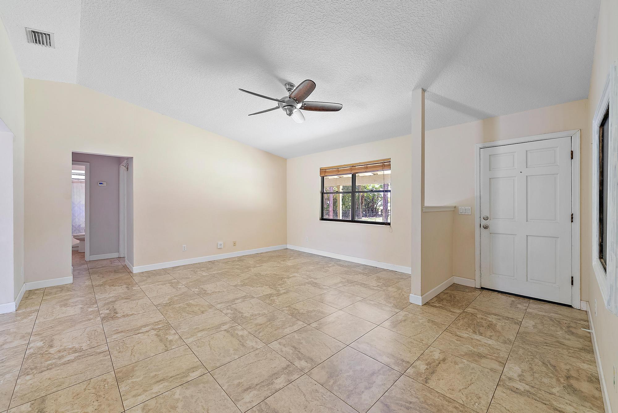 18222 126th Terrace North Jupiter, FL 33478 - Photo 8 of 22 a view of an empty room
