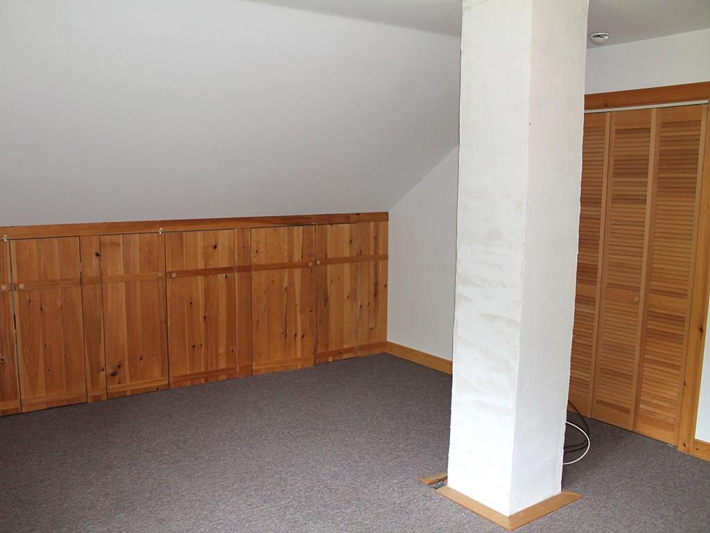 909 Oak Point Road Trenton, ME 04605 - Photo 10 of 30 Downstairs bedroom with storage...