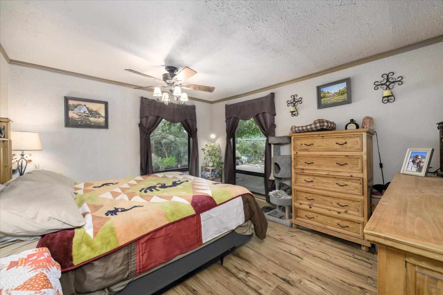 1641 Needmore Drive Shingle Springs, CA 95682 - Photo 12 of 40 a bedroom with a bed and a dresser