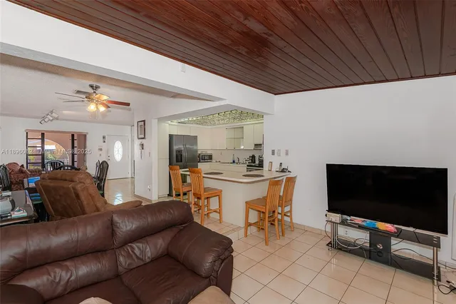 a bedroom with a bed and cabinets